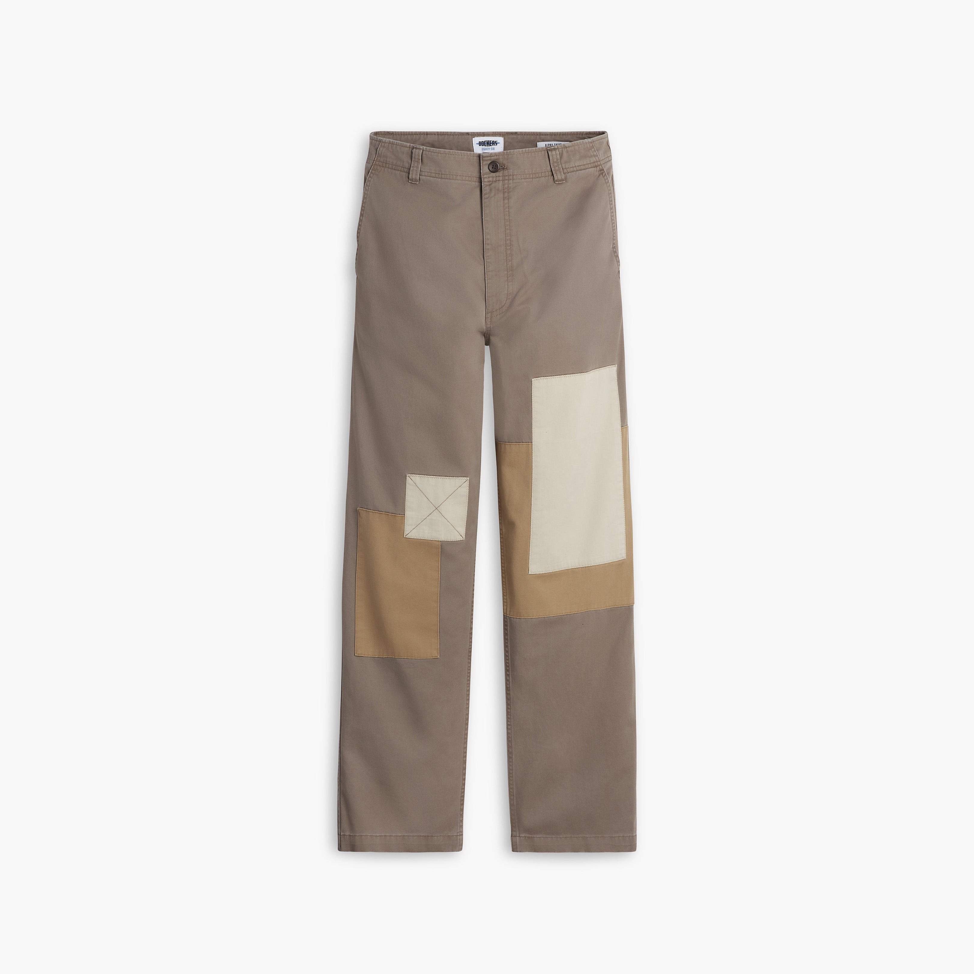 The Dockers Genderless 86 Alpha Chino Patchwork pants are beige with straight legs, made from recycled cotton, and feature square patches on the right thigh and knee.