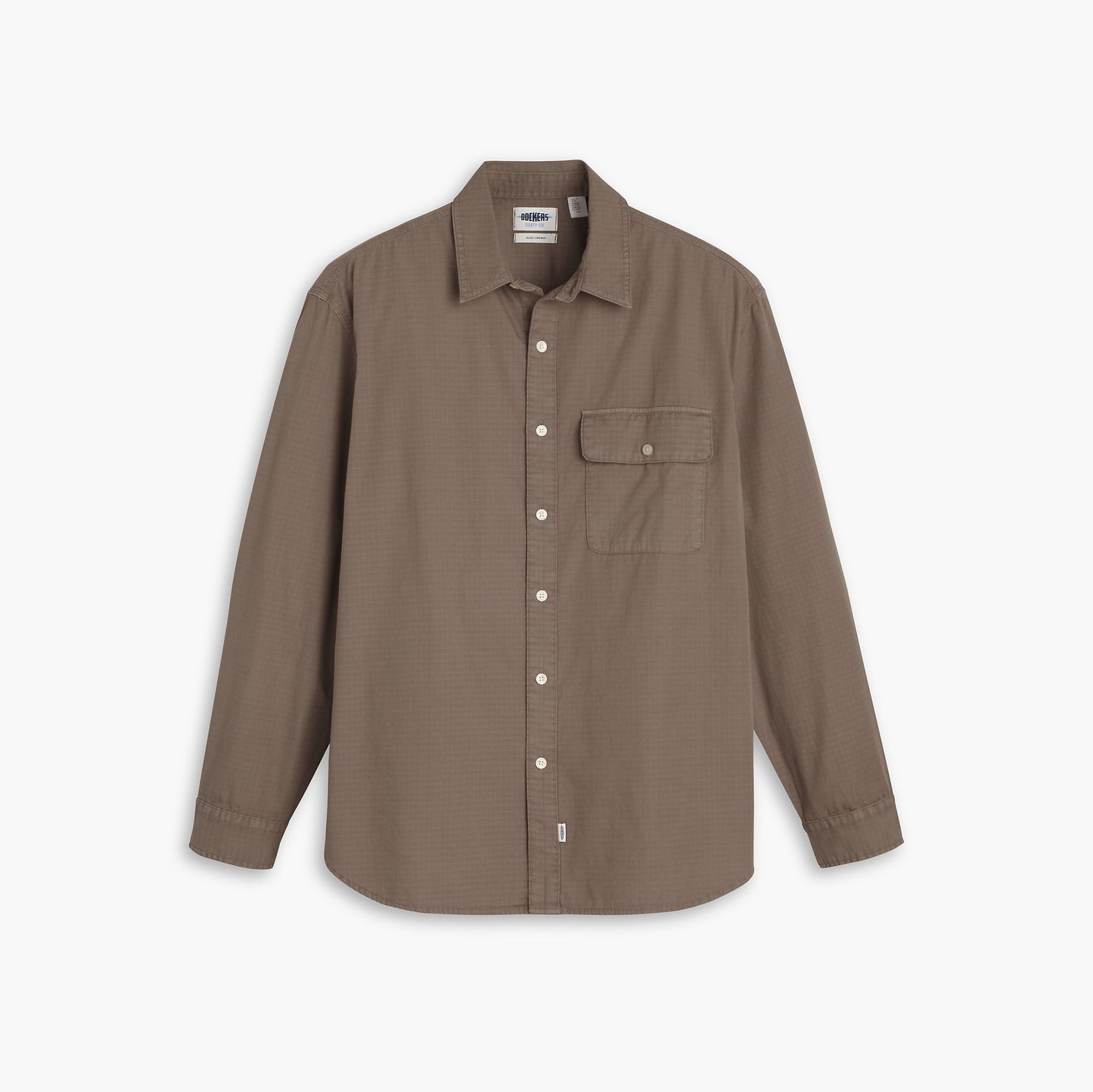 The Dockers Genderless 86 1-Pocket Shirt, LS, is a relaxed-fit brown button-up made from durable cotton ripstop, featuring a single chest pocket and displayed on a white background.