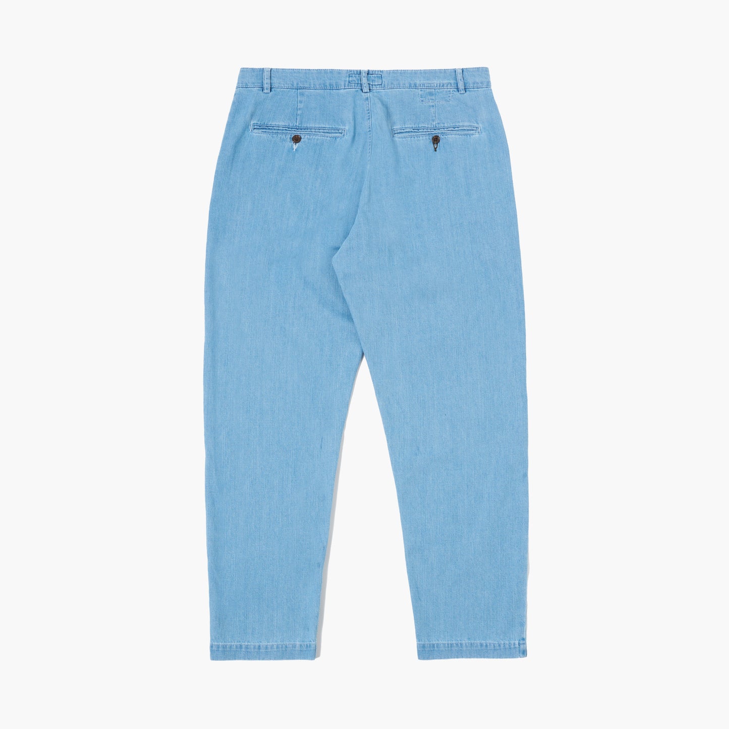Washed indigo 8 Oz Organic Denim Military Chino by Universal Works, shown from the back on a white background, includes two back pockets with button closures.
