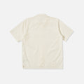 The Universal Works Gardenia Lycot Camp Shirt in Ecru is displayed flat, back side up, against a white background.
