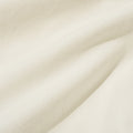 Close-up of the Universal Works Gardenia Lycot Camp Shirt in ecru, featuring soft, off-white fabric with gentle folds and a smooth texture.