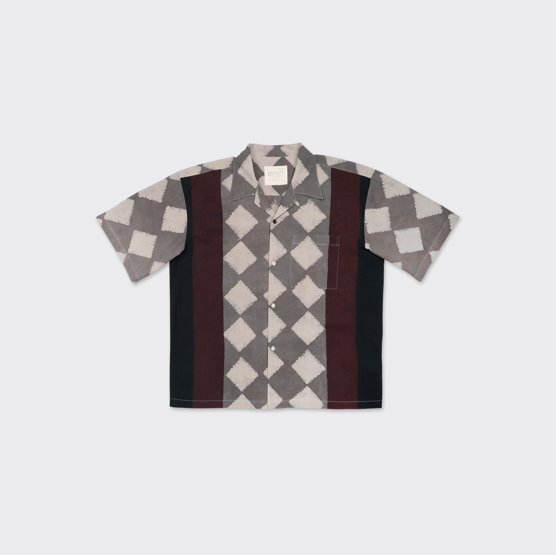 The Kardo Rohit Shirt, Block Print 139, features short sleeves, a chest pocket, and a gray and white diamond design with black and burgundy vertical stripes, shown on a plain background.