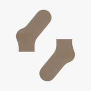 Pair of beige socks on a white background