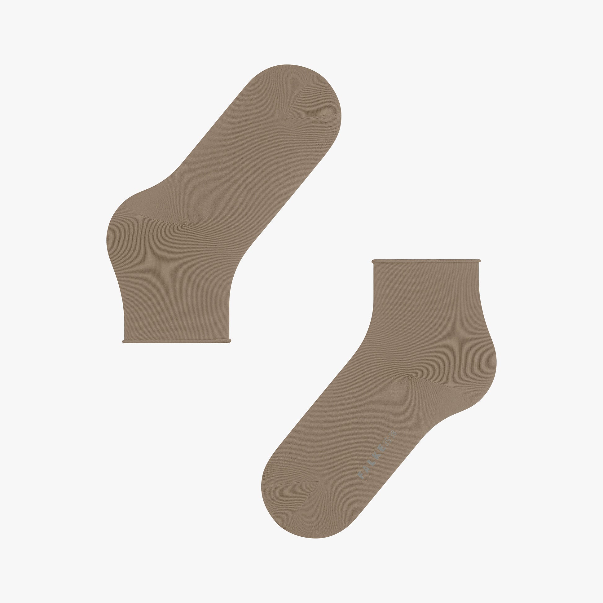 Pair of beige socks on a white background