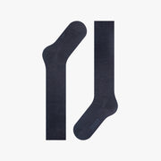 Pair of dark gray socks on a light gray background
