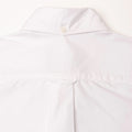 Close-up of the back upper portion of the Gitman Vintage Classic White Oxford, featuring a centered box pleat and a single button on the collar.