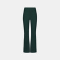 The Emma Pant by Halfdays is displayed, featuring dark green, high-waisted design with flared legs and front pockets, reminiscent of a soft shell ski pant on a plain white background.