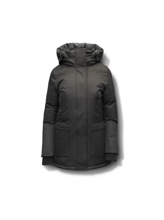 The Nobis Carla Women's Parka is a black hooded winter coat, expertly crafted with Crosshatch fabrication and filled with Canadian duck down. It features a front zipper and large pockets, all showcased against a white background.