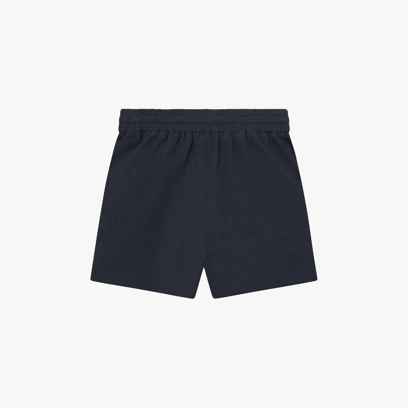 The Les Deux Charlie Shorts in navy blue cotton feature an elastic waistband and are shown flat against a white background—ideal for everyday comfort and casual wear.