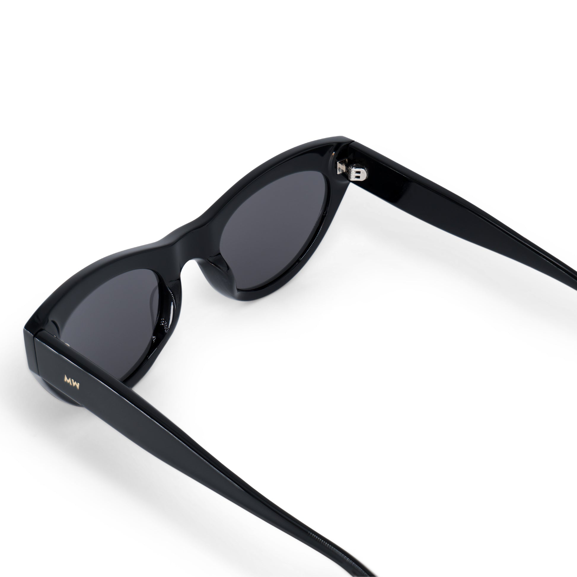 The Messyweekend Donna sunglasses in Grey/Black feature thick frames and dark lenses, shown on a white background.
