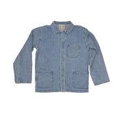 The Jungmaven Olympic Jacket in Light Denim is a unisex cotton/hemp twill chore jacket featuring three front patch pockets, long sleeves, and a collar. Inspired by the classic French Work Coat, shown laid flat on a white background.