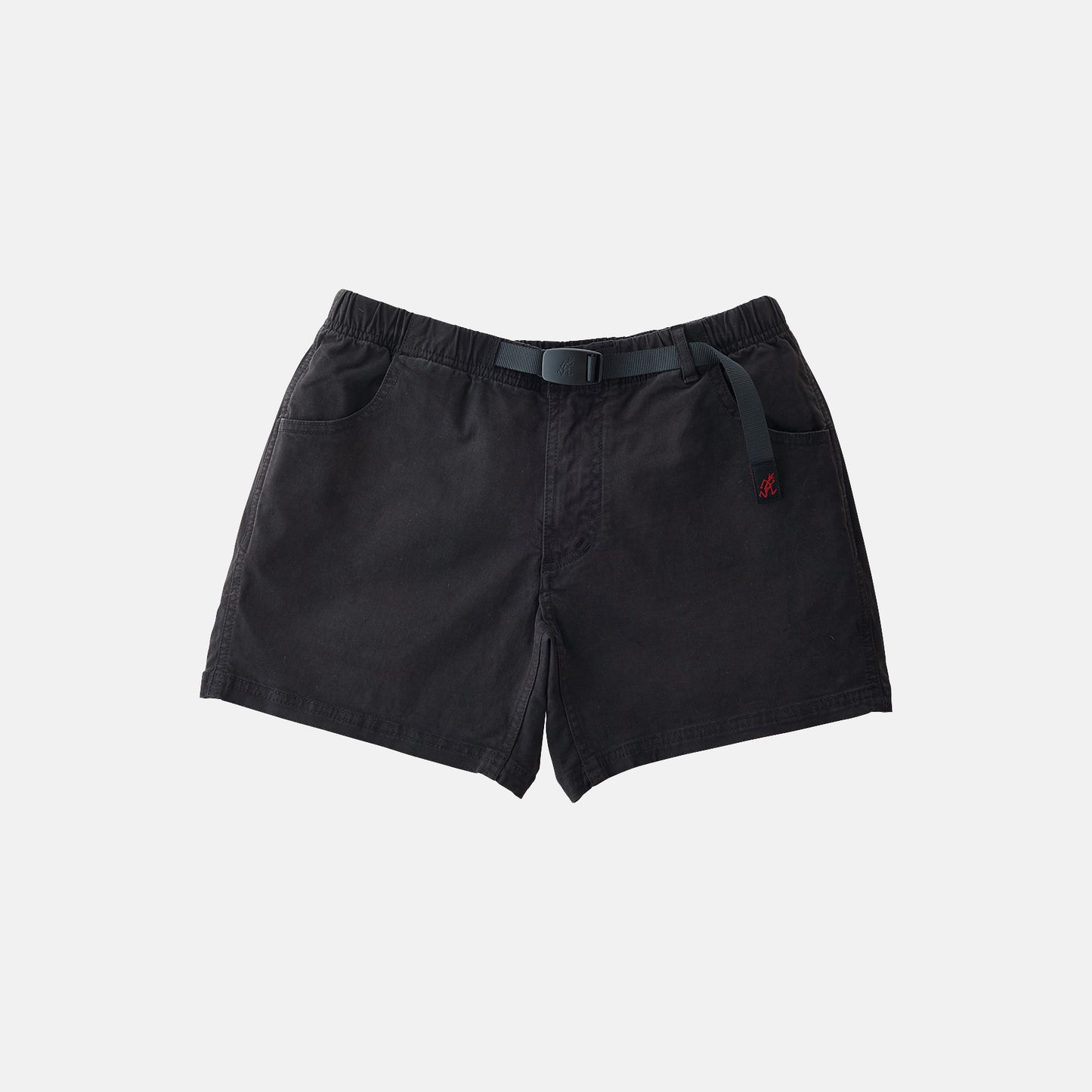 The Gramicci Very Short in black, made from cotton stretch twill, features an integrated belt, elastic waistband, and side pockets—ideal for casual wear.