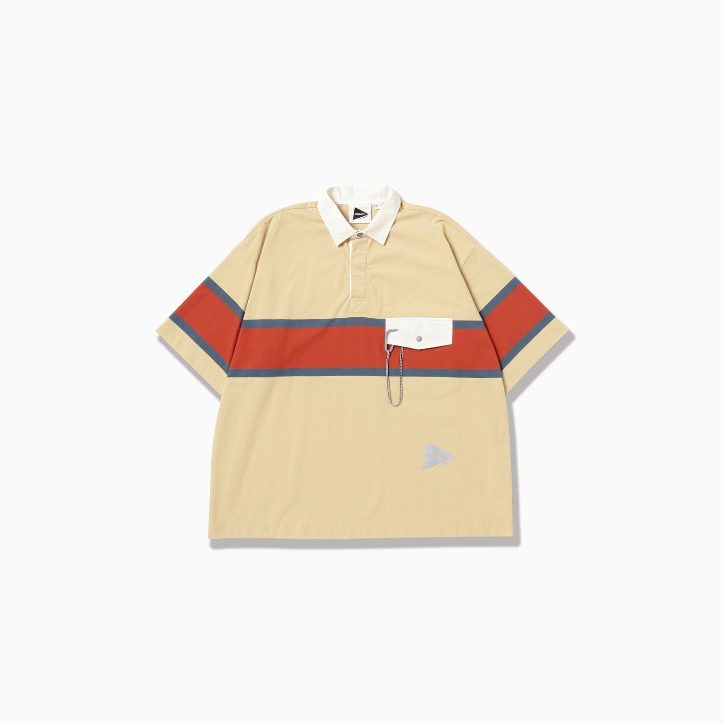 The Tech Rugby Shirt by Gramicci x And Wander features a beige short-sleeve design with red and blue horizontal stripes, complemented by a white collar and a white chest pocket with button and chain.
