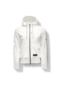The Hedge Men's Performance Hoodie by Nobis is a white jacket with a full front zipper, crafted from textured fabric for enhanced water resistance. It features front pockets and a small patch on the lower front, along with a convenient pocket on the left sleeve for added utility.