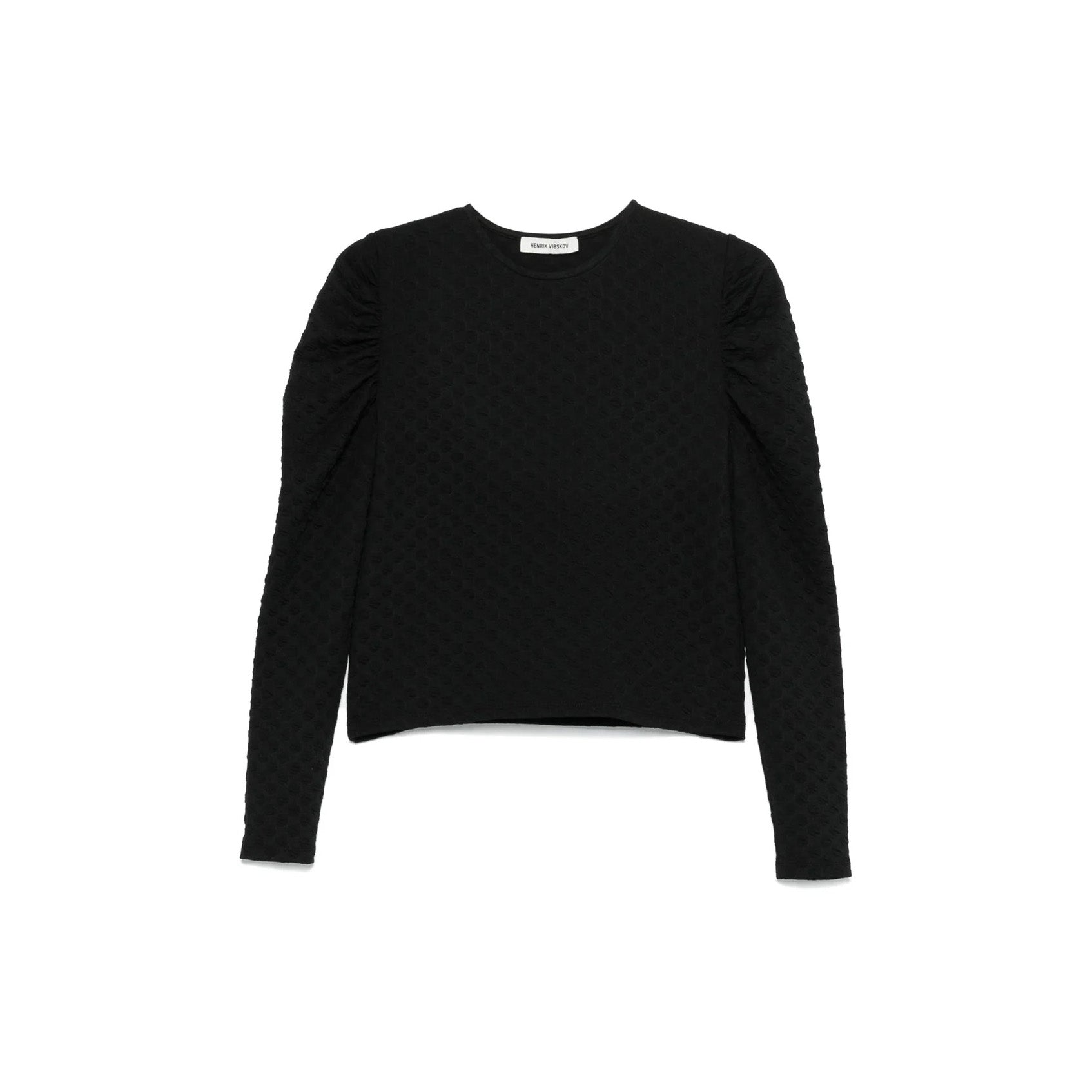 The Sun Reflection Blouse by Henrik Vibskov is a plain black long-sleeve top with gathered shoulders, crafted from bubble-texture material and shown on a white background.