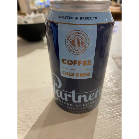 A can of Westerlind Partners coffee cold brew, prominently labeled and roasted in brooklyn, displayed on a white surface.