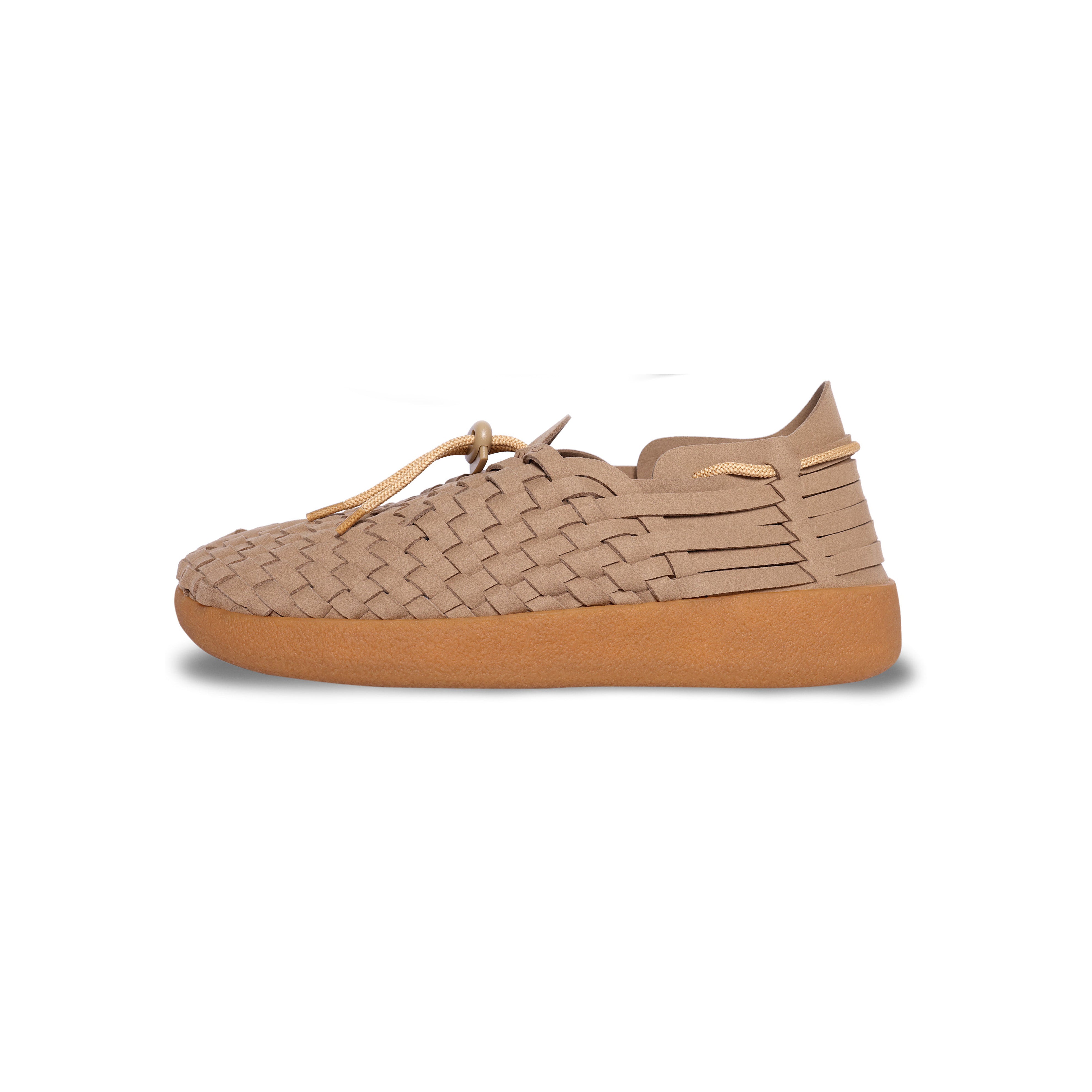 The W Latigo by Malibu Sandals is a tan woven leather sneaker with a thick gum sole and lace-up closure, shown from the side against a white background.