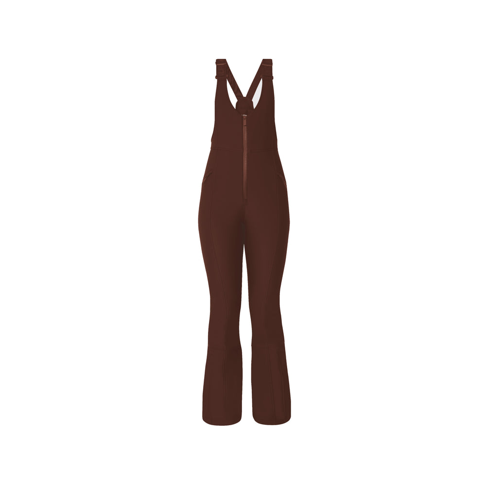 Isabel Soft Shell Bib Pant by Halfdays in brown, featuring a slim-fit design with a front zipper and cross-back straps, displayed on a white background.
