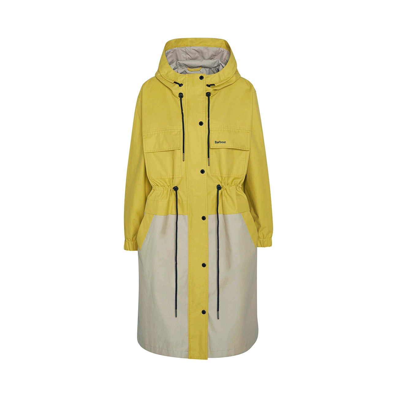 The Barbour Evie Showerproof Parka is a long two-tone yellow and beige jacket with an adjustable hood, black drawstrings, front pockets, and snap buttons, showcased on a white background.