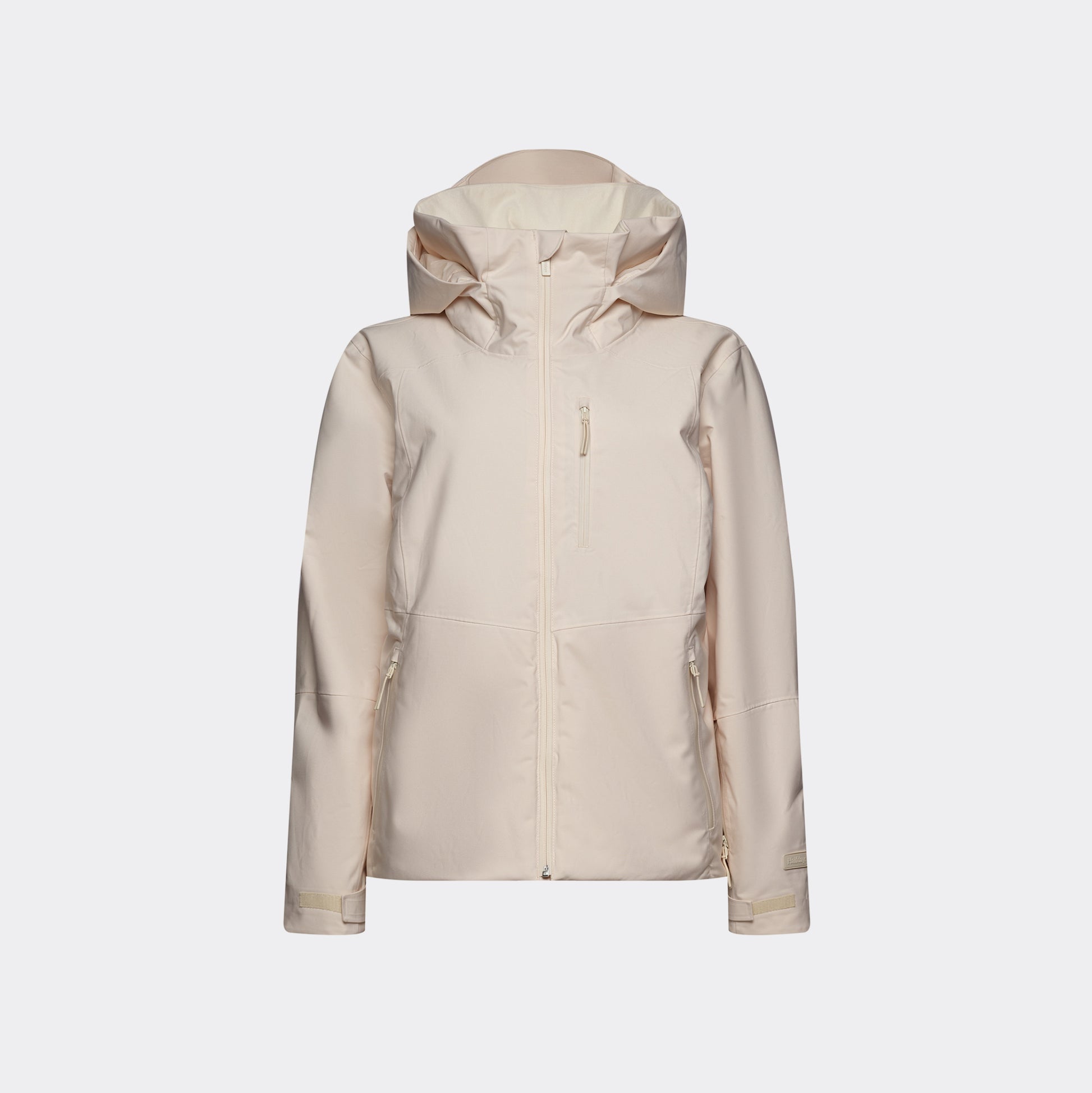 The Lawrence Jacket by Halfdays, a beige insulated women's ski jacket, features a front zipper and pockets and is showcased against a plain white background.