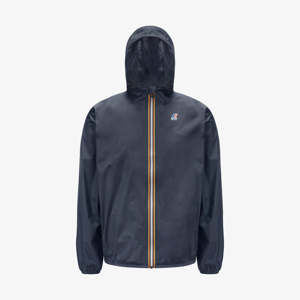 The K-Way Le Vrai 3.0 Claude in Blue Depth is a unisex, water-repellent jacket with a yellow and white striped front zipper and a small logo on the left chest, shown against a plain white background.