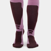 Purple and brown knee-high socks on a white background