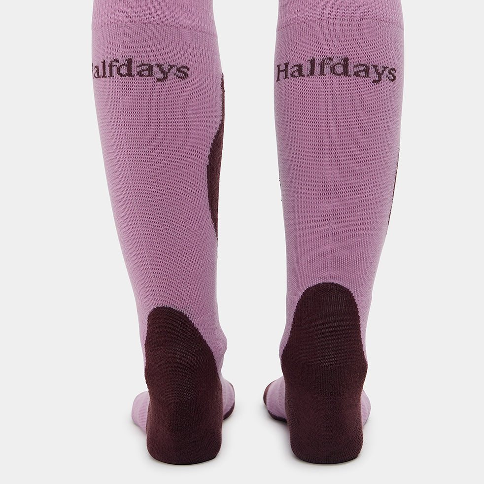 Purple knee-high socks with 'Halfdays' branding on a white background