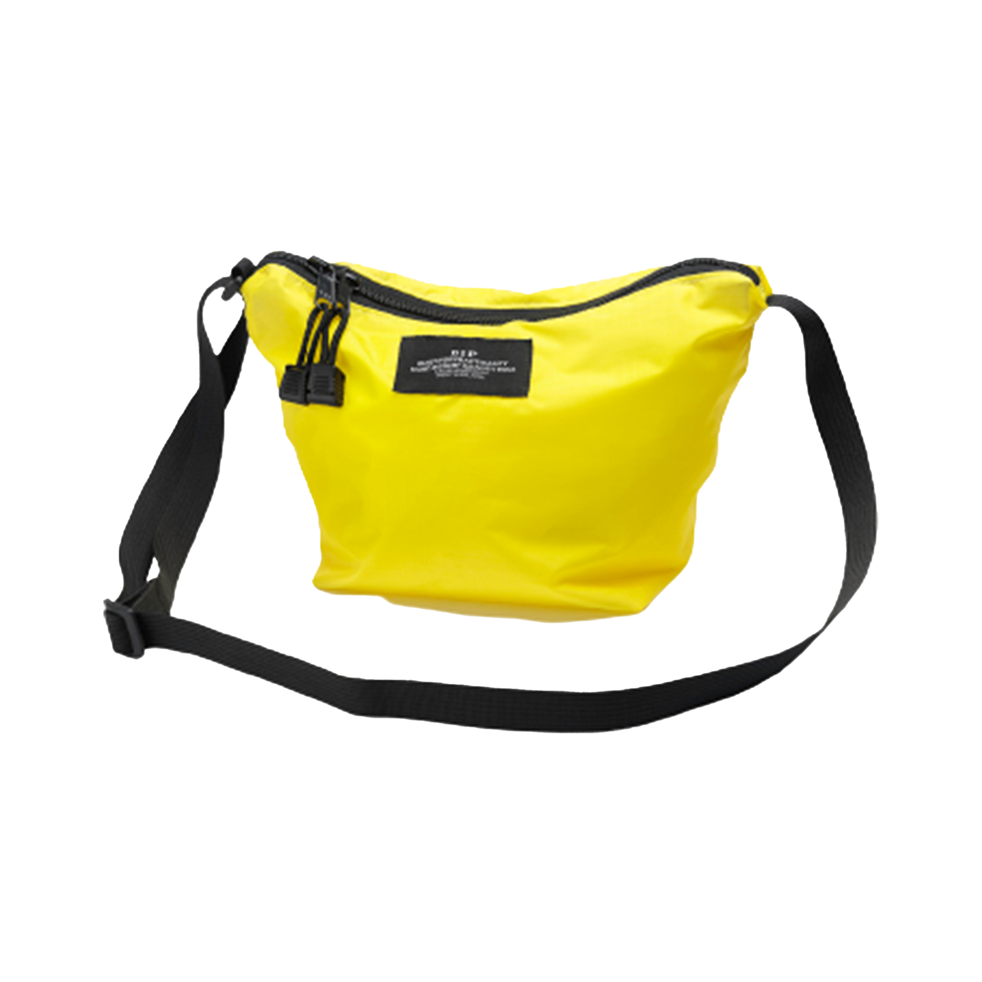 The Micro Tote by Bags in Progress is a yellow sling bag made from lightweight nylon, featuring a black adjustable strap and accented with a rectangular black patch on the front.