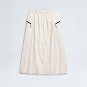 The North Face's W North Dome Wind Skirt is a long white skirt featuring an elastic waistband and black trim on two side pockets, shown against a plain background.