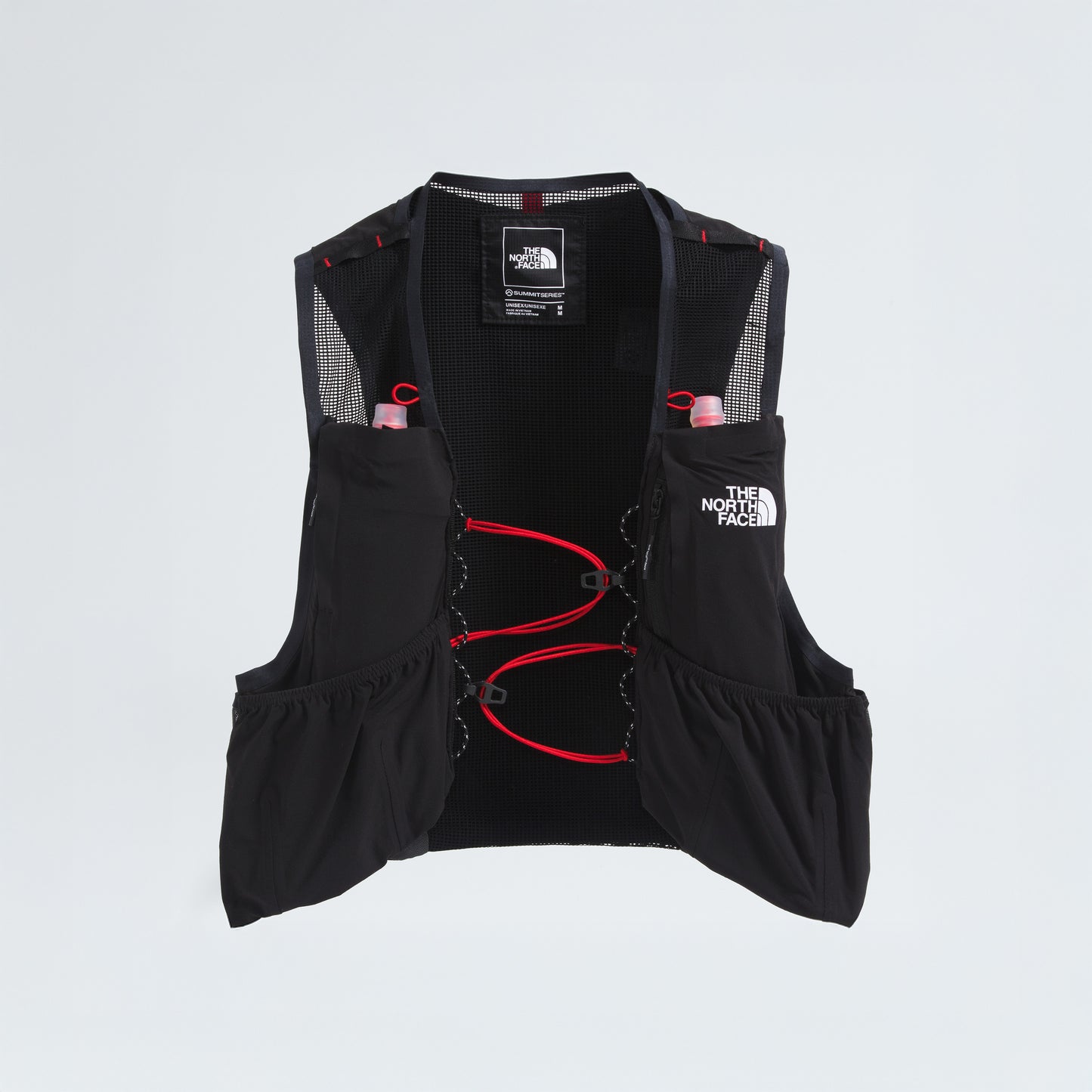 The North Face's U Summit Run Vest 5 is a black racing vest with red accents, mesh panels, multiple pockets, and two pink water bottles in front pockets against a white background—ideal for race day.