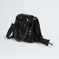 The North Face Base Camp Mini Tote, made from recycled fabric, showcases a glossy black look with a striped handle. Its stylish design features a shoulder strap, top flap opening, and internal organization to keep essentials secure.
