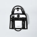 The Base Camp Mini Tote from The North Face is a sleek black and white rectangular bag made from recycled fabric, featuring rope handles, an internal organization system, a front pocket, and the iconic logo.