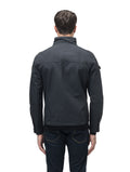 Back view of a man wearing the Admiral Men's Jacket and jeans, with advanced fabric technology from Nobis, perfect for facing forward with confidence.
