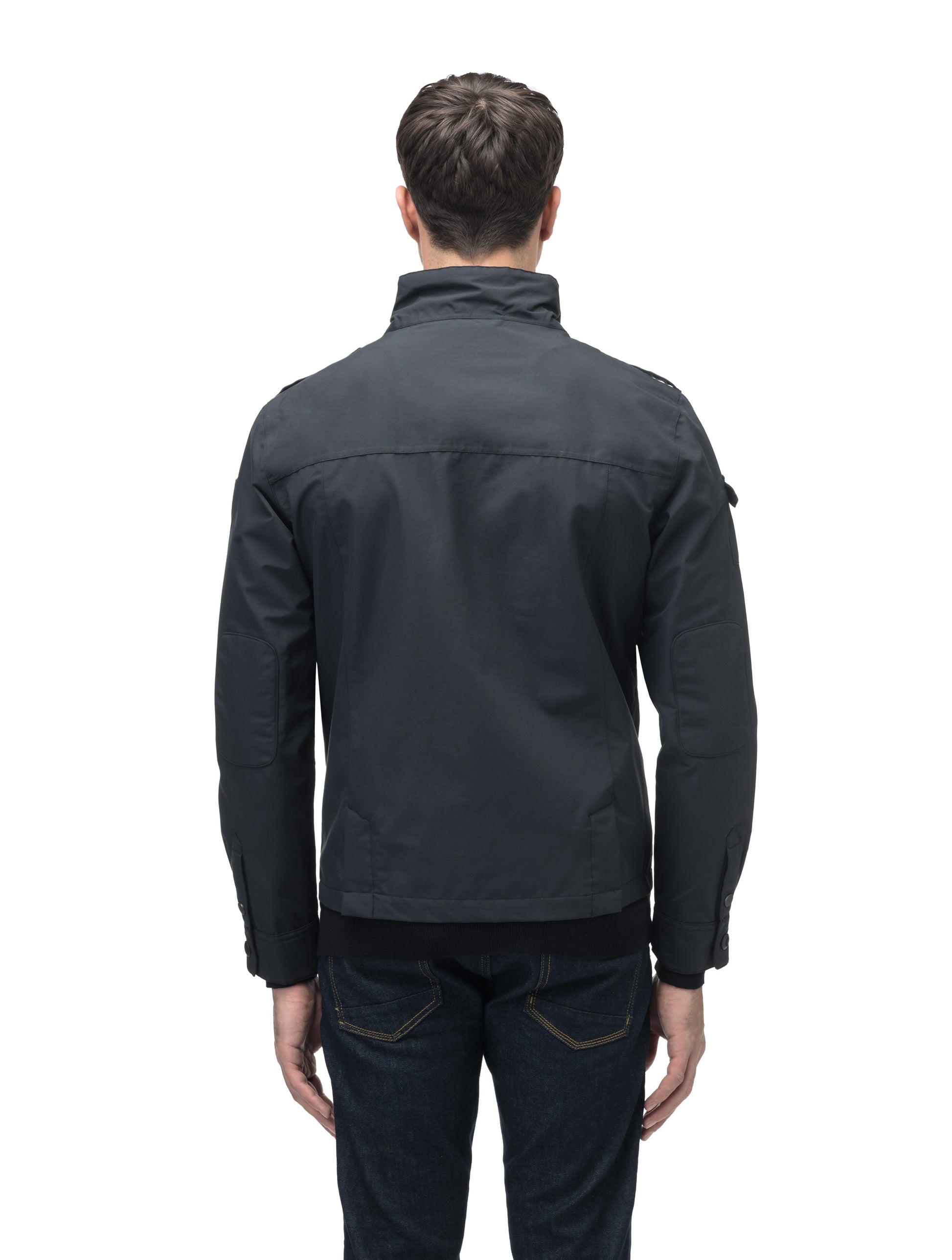 Back view of a man wearing the Admiral Men's Jacket and jeans, with advanced fabric technology from Nobis, perfect for facing forward with confidence.
