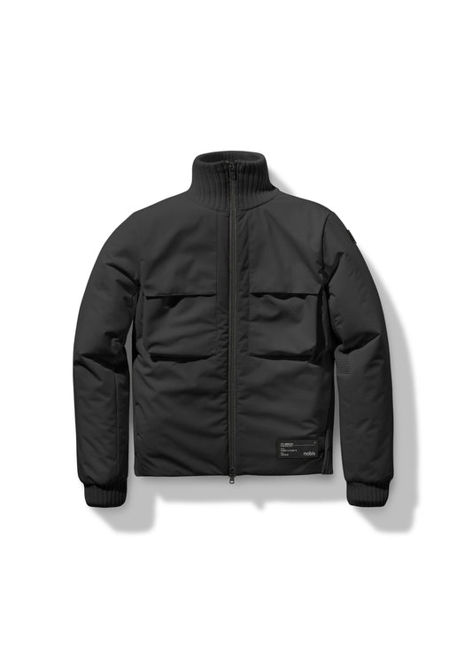 The Layton Men's Tactical Hybrid Sweater by Nobis combines warmth and style with Primaloft Gold Insulation, a high collar, front zipper, and two large front pockets. A small label on the lower left side adds subtle branding.