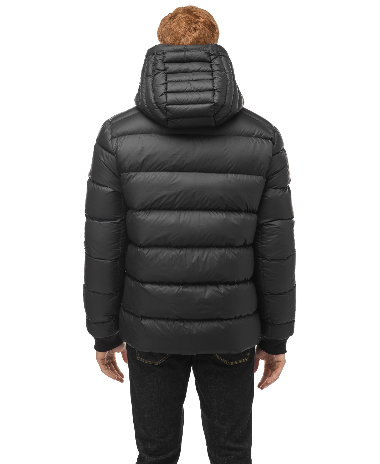 The figure, viewed from behind, wears the versatile Oliver Men's Reversible Puffer Jacket by Nobis. Its black hooded design effortlessly transitions from day to night, making it a two-in-one essential that Oliver would find perfect for any occasion.