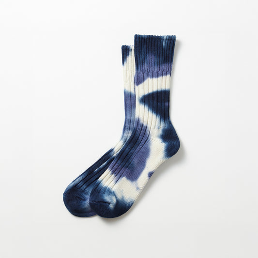 The Chunky Ribbed Crew Socks in Tie Dye Navy/Blue from RoToTo, featuring a blue and white tie-dye design, are displayed against a plain background.