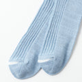 Close-up of RoToTo's Hemp/Organic Cotton Stripe Sock in Morning Blue/White, featuring ribbed details and white accents at the toes, set against a plain background.
