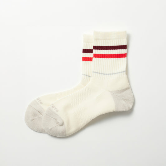 A pair of RoToTo Allrounder 2Stripe Merino Crew socks in Burgundy/Red, featuring red and brown stripes near the top, on a white background.