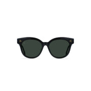 Raen Optics Nikol sunglasses in recycled black feature green polarized lenses and three small gold dots on each upper outer corner, shown on a white background.