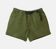 Westerlind's "Very Short, Olive" cotton stretch twill shorts feature an elastic waistband, front pockets, and a black integrated Gramicci belt—ideal for hiking. Displayed against a plain white background.