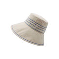 White Tide Lines bucket hat with cobalt blue stitching isolated on a white background by Lola Hats.
