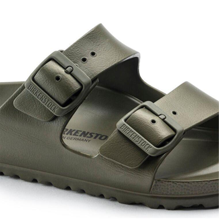 A close-up of the Birkenstock Arizona EVA Narrow sandal in khaki, featuring the classic footbed, two adjustable buckled straps, and a textured water-friendly sole.