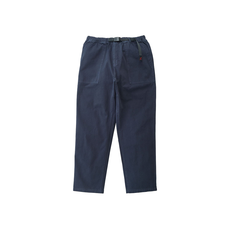 Gramicci's Loose Tapered Ridge Pants in dark blue come with a built-in belted closure, an elastic waistband, and front patch pockets for a blend of style and functionality.