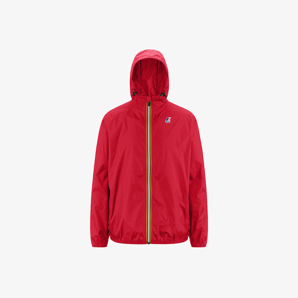 The K-Way Le Vrai 3.0 Claude in red features a yellow zipper and elastic cuffs, showcased on a plain white background.