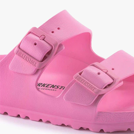 A close-up of the Birkenstock Arizona EVA Narrow sandal in Candy Pink, featuring two adjustable straps for a perfect fit.