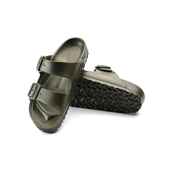 A pair of khaki Birkenstock Arizona EVA Narrow sandals with adjustable two-strap buckles—one upright, one on its side to show the textured sole and signature footbed. Water-friendly for everyday wear.