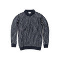 The Nordsjo Crew Neck by Devold is a navy knitted sweater made from Norwegian wool, featuring white polka dots and ribbed collar, cuffs, and hem. Designed for a unisex fit, it serves as an ideal mid-layering piece when laid flat on a white background.