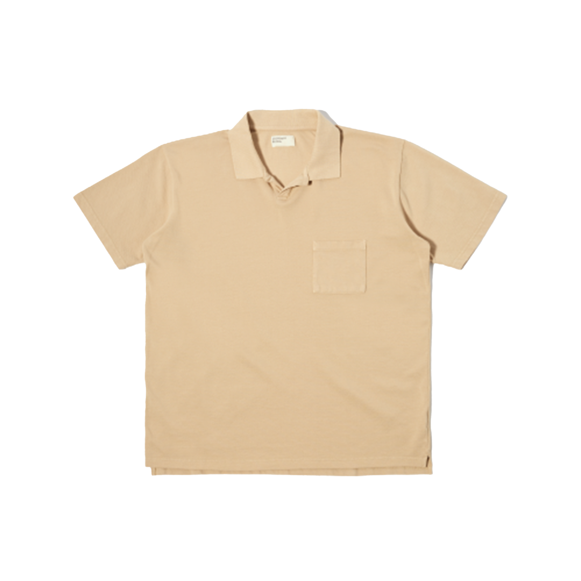 The Universal Works Vacation Polo in Sand is a short-sleeve collared shirt with a single chest pocket, shown laid flat on a white background.