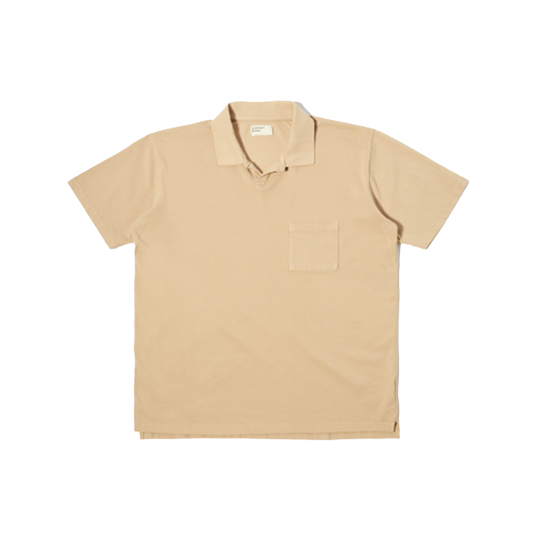 The Universal Works Vacation Polo in Sand is a short-sleeve collared shirt with a single chest pocket, shown laid flat on a white background.